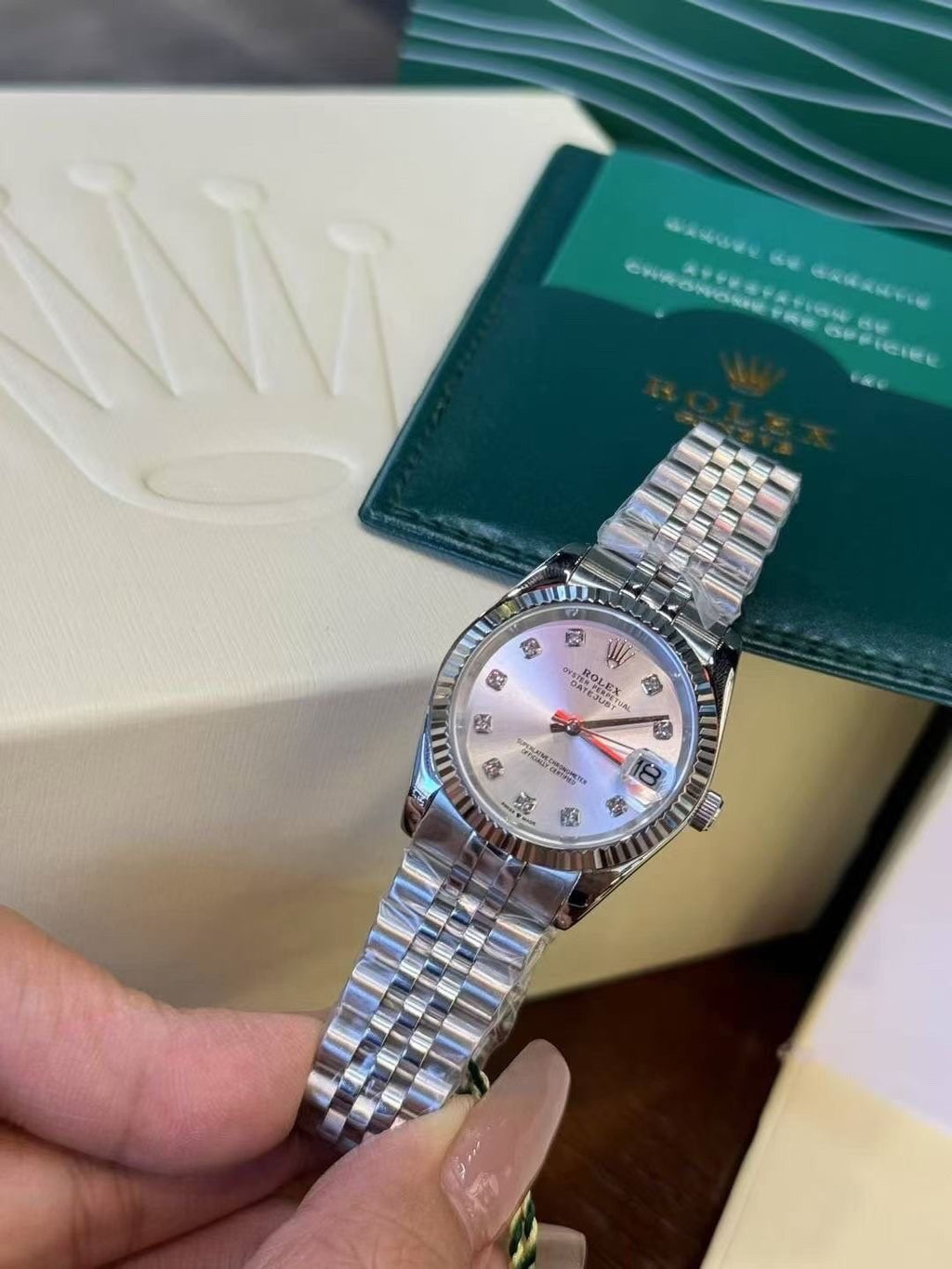 Rolex White Mother-of-Pearl Dial Watch — front